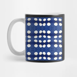 White pebbles on blue background Mug
